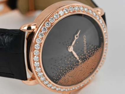 Appreciating the Replica Cartier RÉVÉLATION D’UNE PANTHÈRE wristwatch.